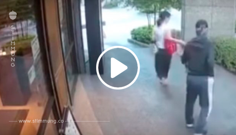 Schockierender Moment: Ein Mann versucht, der Mutter sein Kind mitten in der Straße zu nehmen