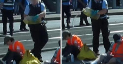Bei Klebe-Demo: Polizistin schüttet Klimaaktivisten Öl über den Kopf
